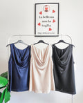 top elegante con scollo morbido drappeggiato