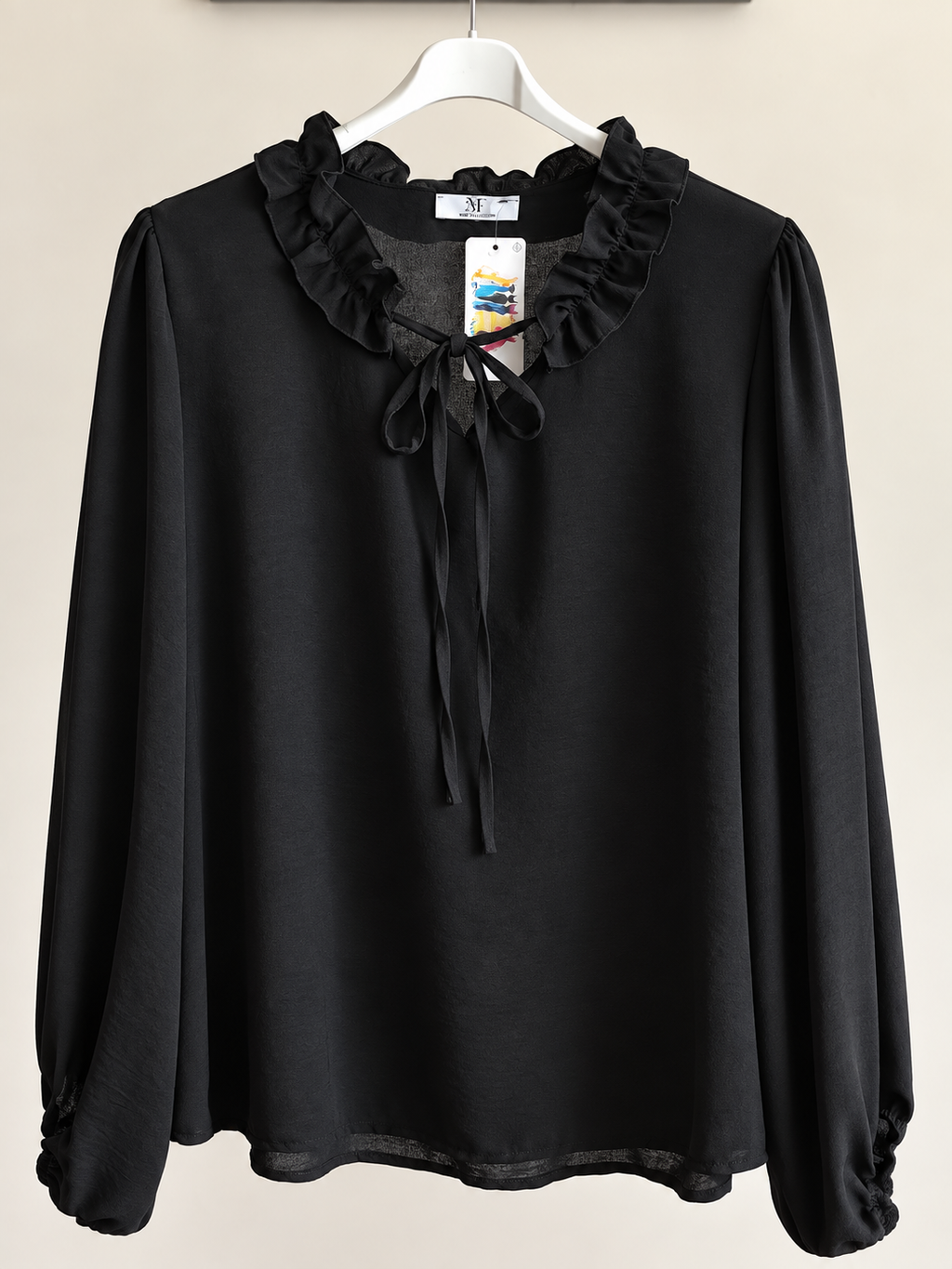 Blusa romantica con fiocchetto