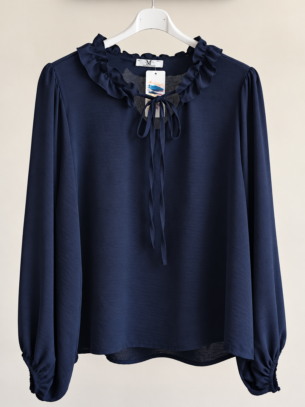 Blusa romantica con fiocchetto
