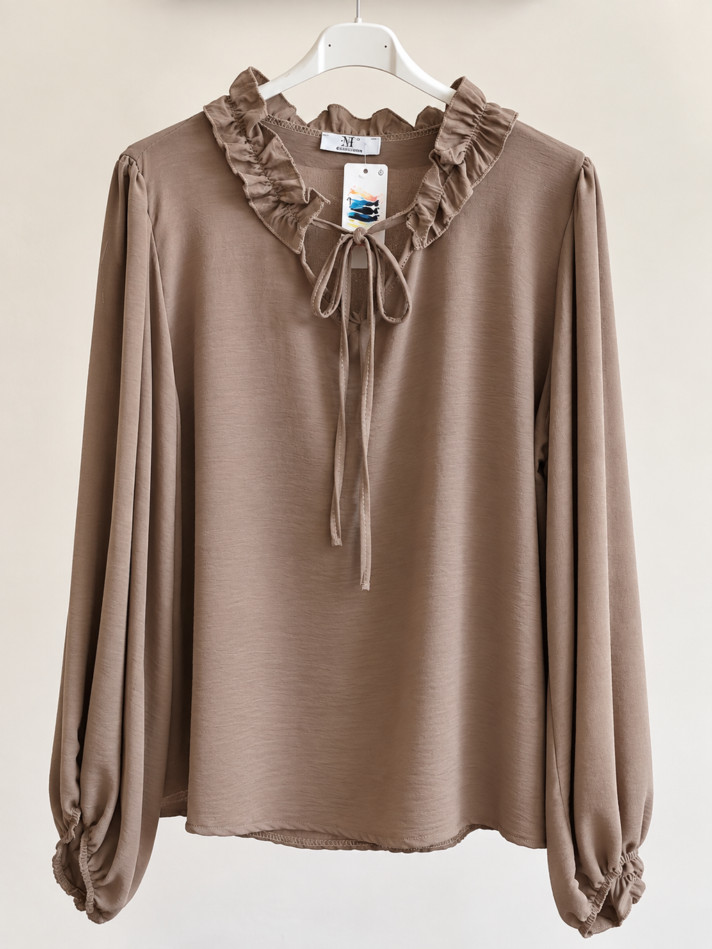 Blusa romantica con fiocchetto