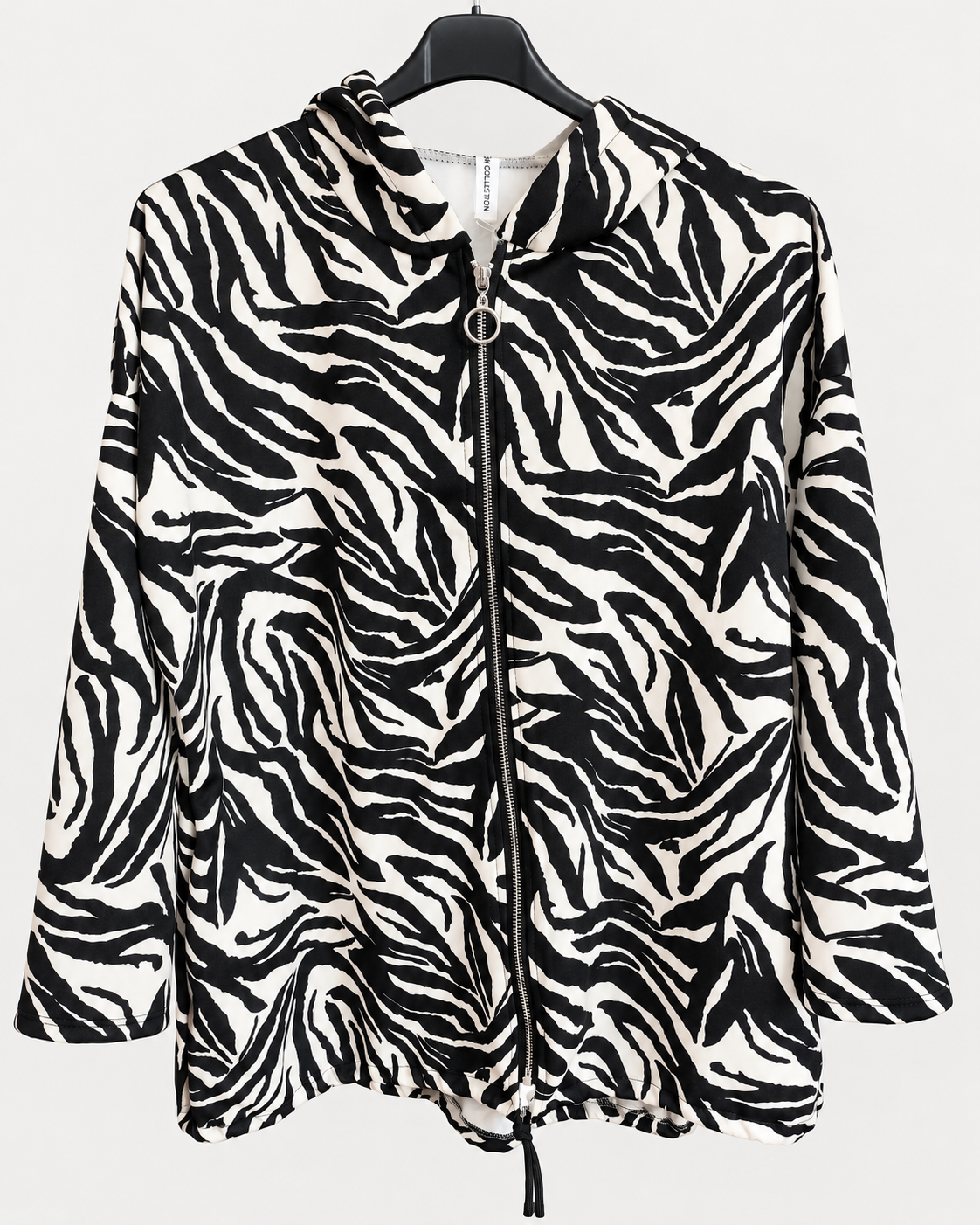 Tuta curvy zebrata con cappuccio e zip