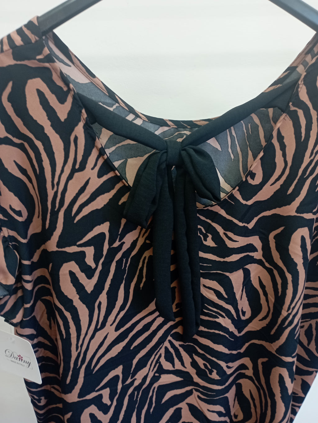 Blusa safari con fiocchetto dietro