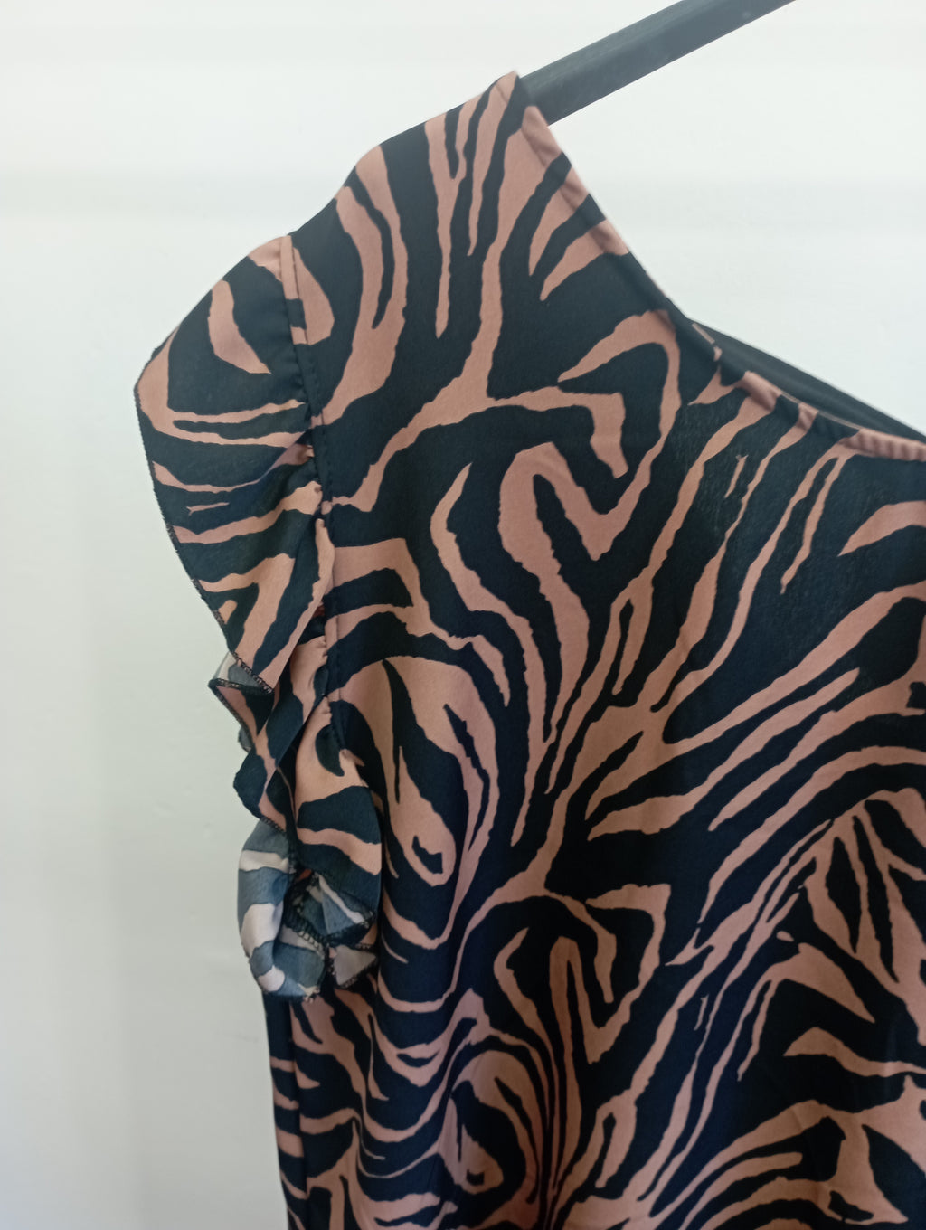 Blusa safari con fiocchetto dietro