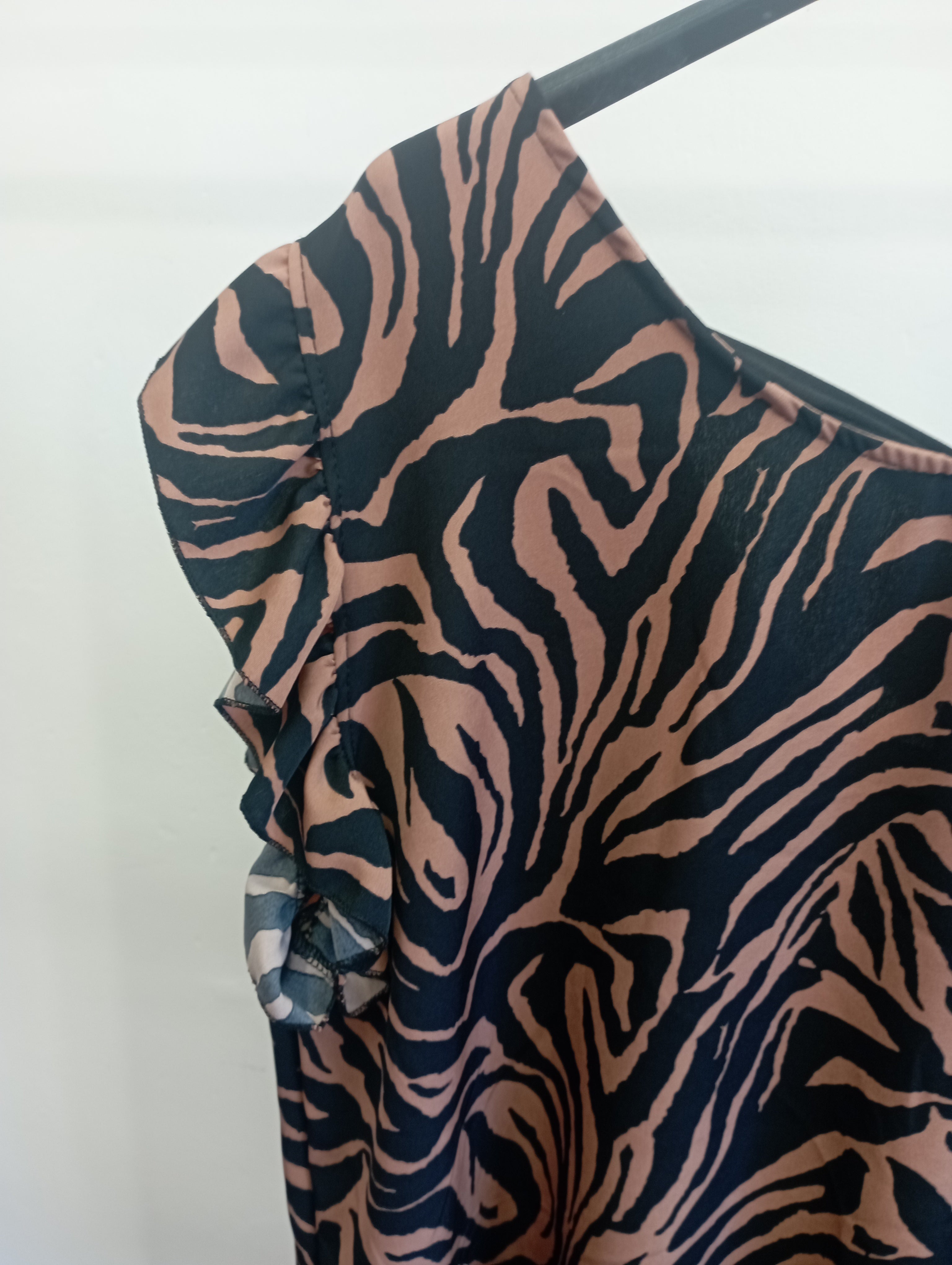 Blusa safari con fiocchetto dietro